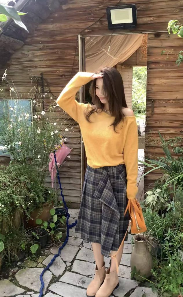 2025 Autumn New Lazy Style Off-Shoulder Yellow Knit Sweater and Irregular Plaid Skirt Set